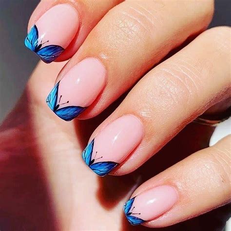 white french tip with butterflies|female french tips with butterflies.